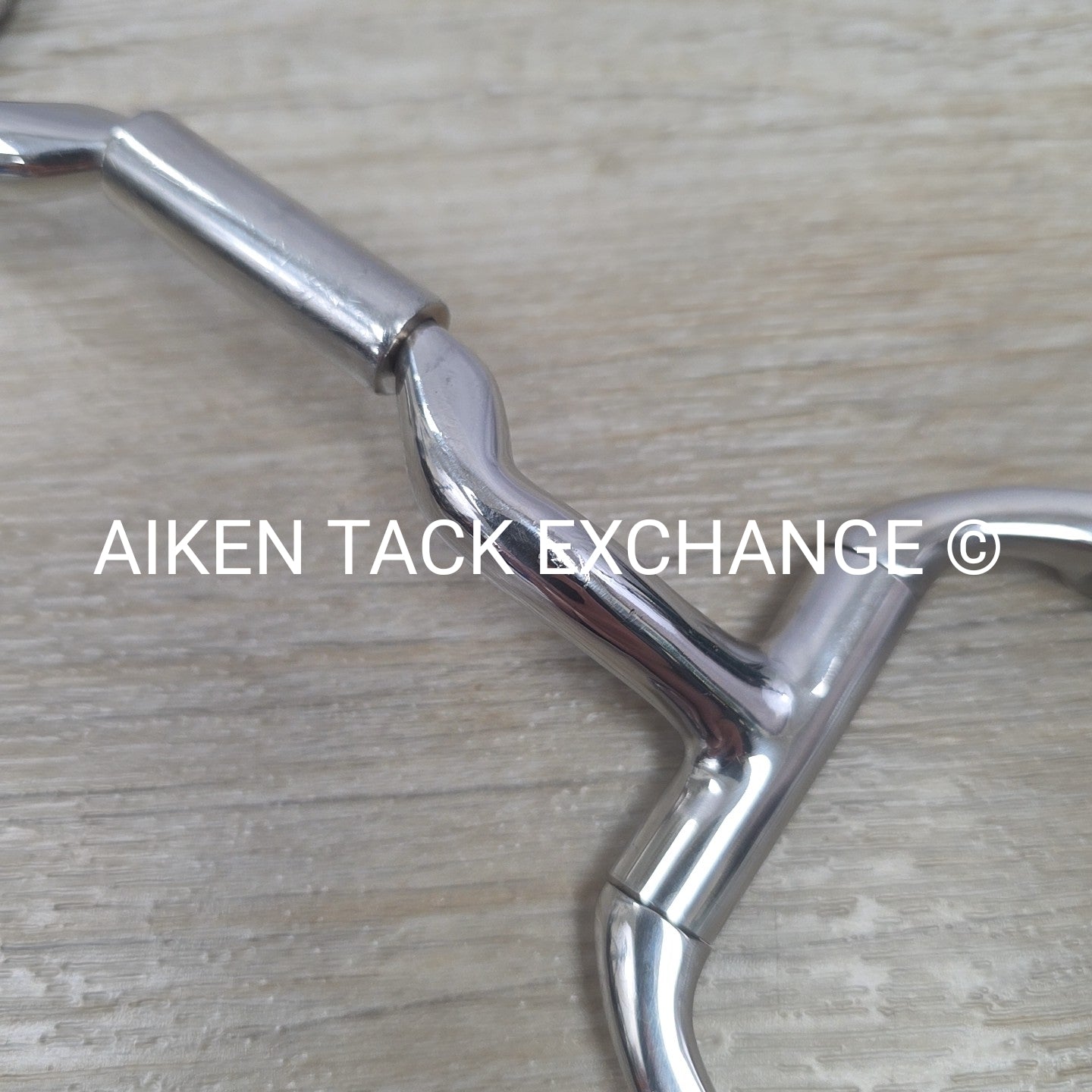 Myler Eggbutt with Hooks and Mullen Forward Tilt Low Ported Brrel MB 36 5"