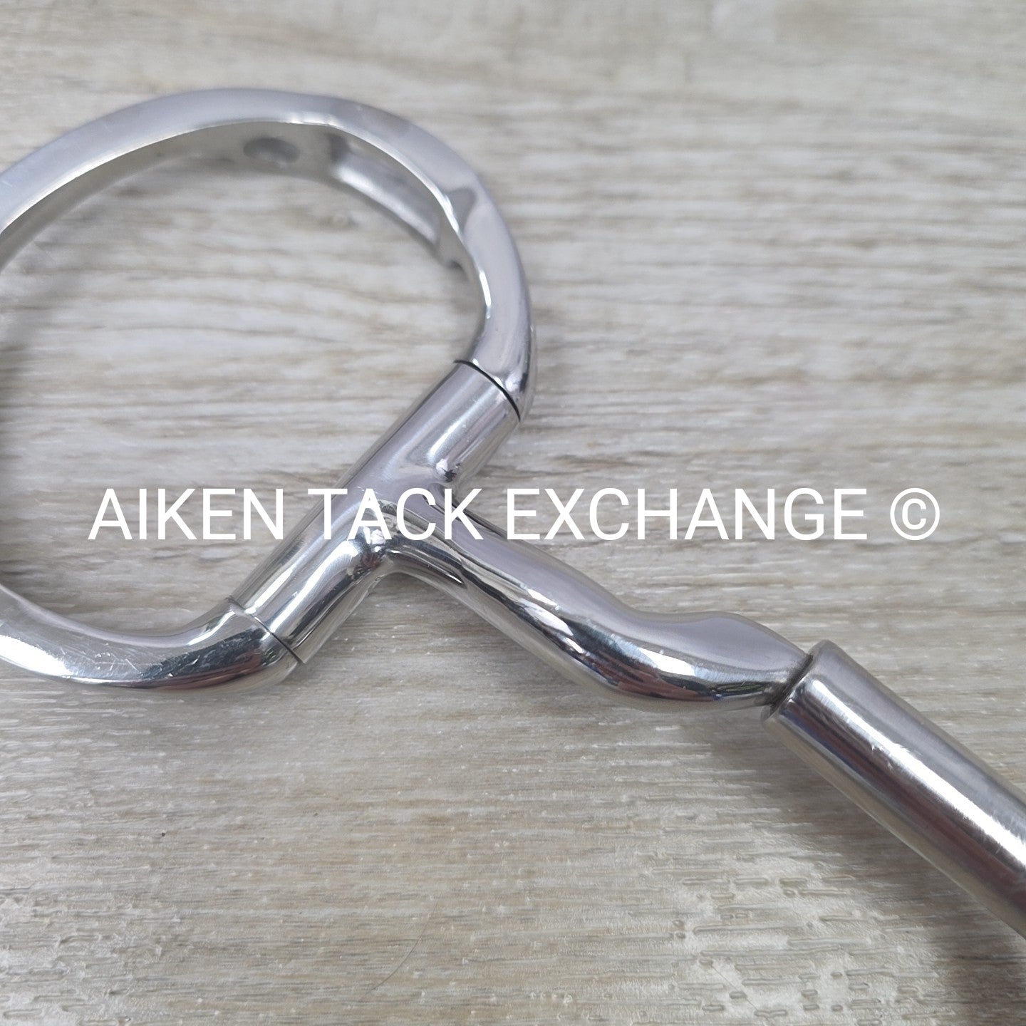 Myler Eggbutt with Hooks and Mullen Forward Tilt Low Ported Brrel MB 36 5"